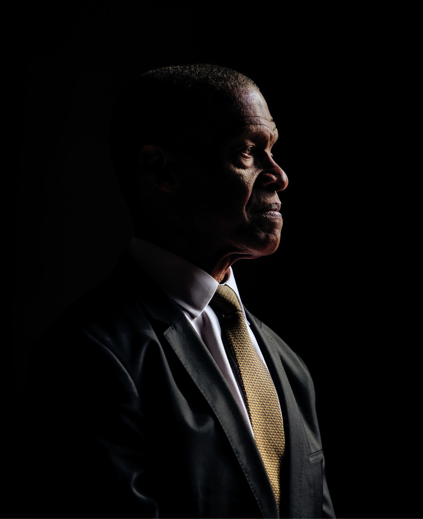 portrait of Erroll Southers on a dark background
